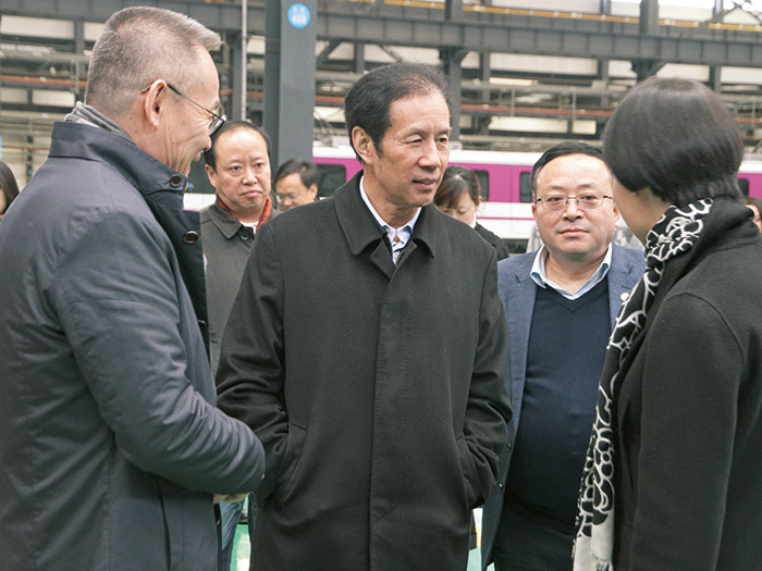  原四川省人大副主任陈光志一行莅临四川发展j9集团平台股份调研指导工作,公司董事长肖光辉陪同